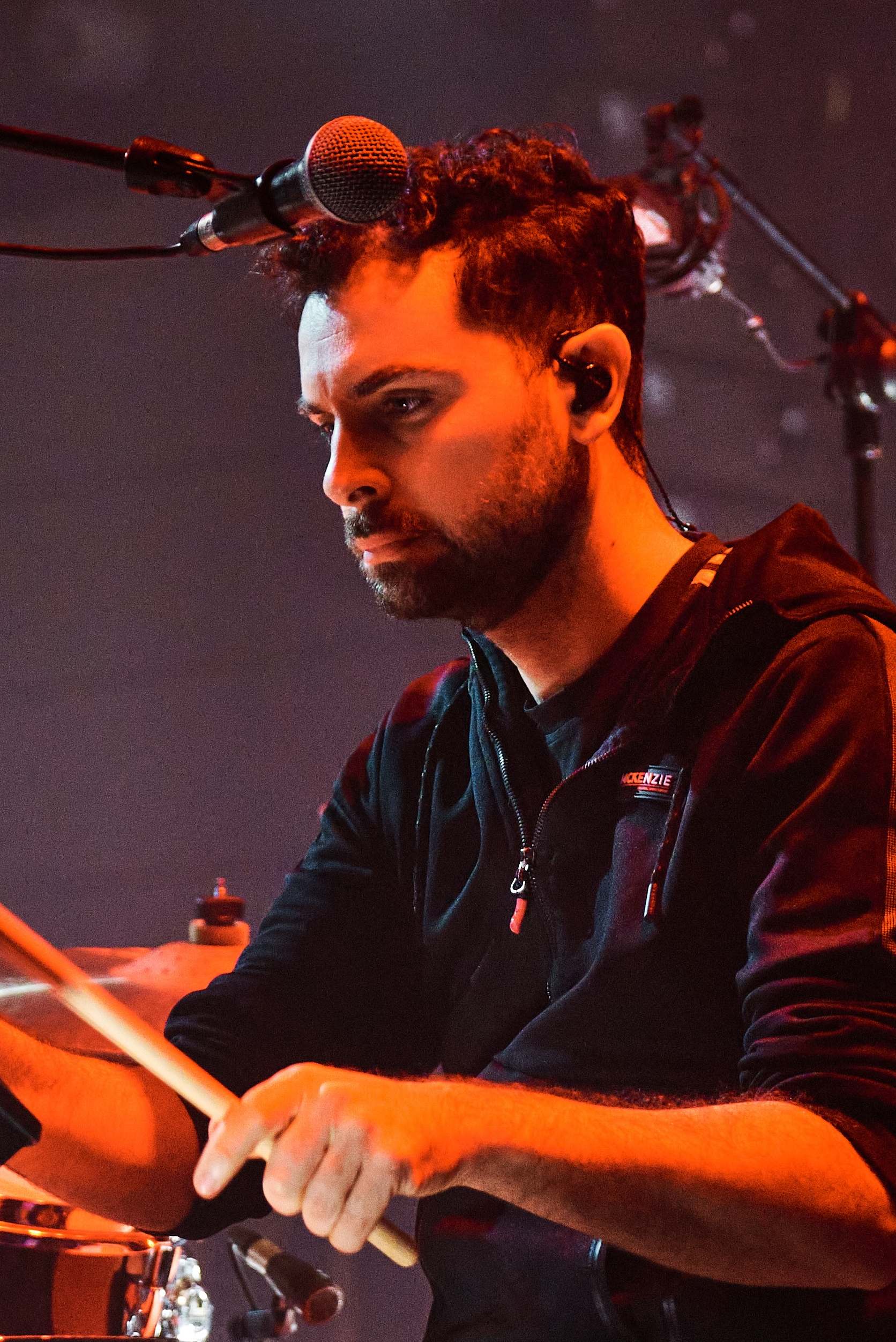 Miguel Lamas performing with the DREAM custom in-ear monitor in his ear